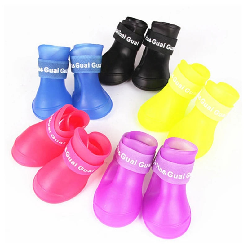 Colorful waterproof dog boots (Anti-Slip Rain Shoes) in various sizes for pet paw protection.