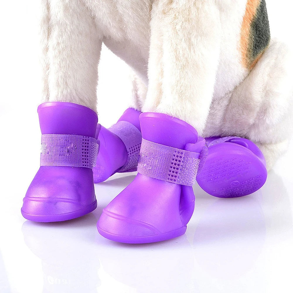 Purple waterproof dog boots (Anti-Slip Rain Shoes) for protection against rain and mud, featuring anti-slip soles.