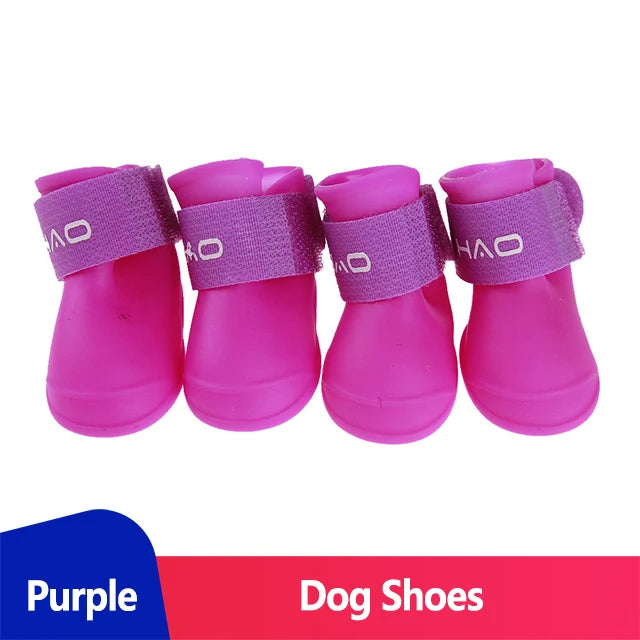 Waterproof dog boots (Anti-Slip Rain Shoes) in purple for dogs, featuring adjustable straps for comfort.