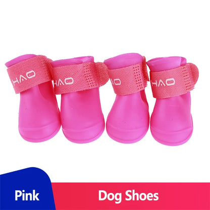 waterproof dog boots (Anti-Slip Rain Shoes) for pets in pink with adjustable straps and anti-slip soles.