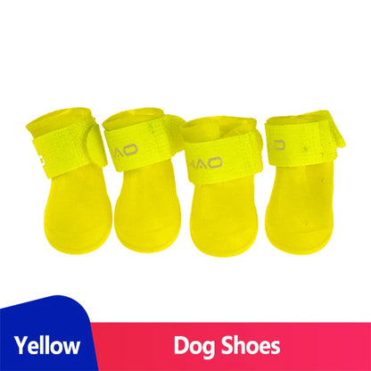 waterproof dog boots (Anti-Slip Rain Shoes) in yellow, designed for traction and comfort during outdoor walks.